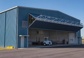 Small Aircraft Hangar with Folding Door BY-082