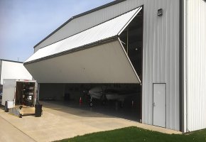 Small Aircraft Hangar with Folding Door BY-082