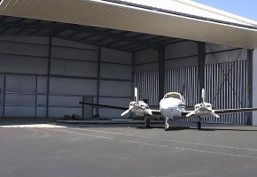 Small Aircraft Hangar with Folding Door BY-082